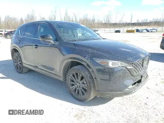 2022 Mazda CX-5 2.5 Turbo with VIN JM3KFBAY1N0636626, listed as a Copart auction lot 52257685 with 41,329 mi miles and Salvage Title. Bid and sale history available at carsss.com. Image 12.