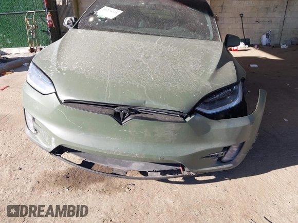 2020 Tesla Model X Long Range with VIN 5YJXCDE24LF272242, listed as a IAAI auction lot 41275226 with 103,731 mi miles. Bid and sale history available at carsss.com. Image 6.