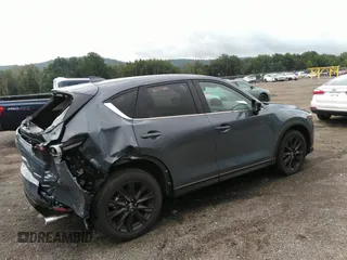 2023 Mazda CX-5 2.5 S Carbon Edition with VIN JM3KFBCM1P0209900, listed as a IAAI auction lot 37342913 with 3,853 mi miles. Bid and sale history available at carsss.com. Image 4.