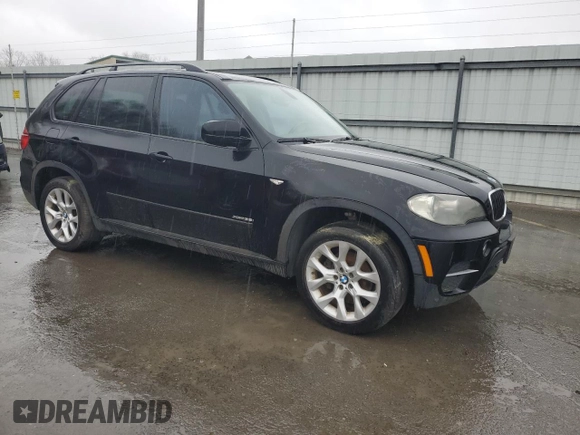2011 BMW X5 35i with VIN 5UXZV4C50BL402804, listed as a Copart auction lot 51707735 with 118,209 mi miles and Clean Title. Bid and sale history available at carsss.com. Image 4.