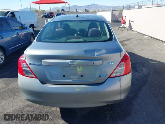 2012 Nissan Versa SV with VIN 3N1CN7AP0CL921230, listed as a IAAI auction lot 42151993 with 184,676 mi miles. Bid and sale history available at carsss.com. Image 6.