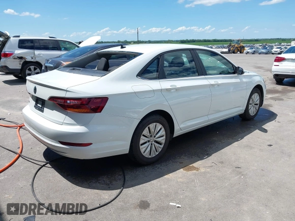 2019 Volkswagen Jetta S z VIN 3VWC57BU7KM200586, wystawiony jako IAAI lot #42609606 z przebiegiem 72 874 mil mil oraz . Historia ofert i sprzedaży dostępna na DreamBid. Obrazek 4.