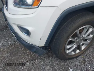 2014 Jeep Grand Cherokee Limited with VIN 1C4RJFBGXEC186833, listed as a IAAI auction lot 42677411 with 117,685 mi miles and . Bid and sale history available at DreamBid. Image 6.