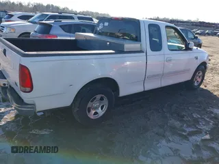 2003 Ford F-150 XL with VIN 1FTRX17W93NB66494, listed as a IAAI auction lot 41451666 with 205,770 mi miles. Bid and sale history available at carsss.com. Image 4.