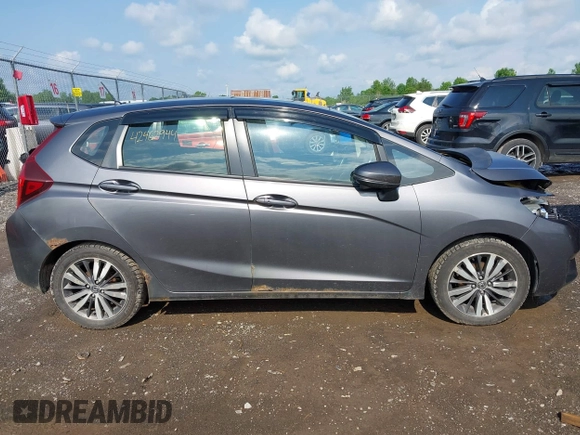 2016 Honda Fit EX with VIN JHMGK5H7XGX042621, listed as a IAAI auction lot 42462944 with 164,451 mi miles and . Bid and sale history available at DreamBid. Image 13.
