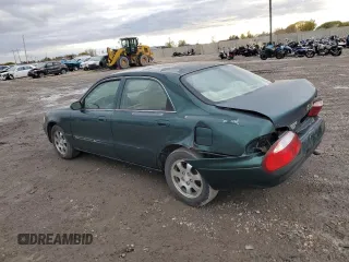 2001 Mazda 626 LX with VIN 1YVGF22C215245817, listed as a Copart auction lot 80491144 with 147,603 mi miles and Salvage Title. Bid and sale history available at carsss.com. Image 2.