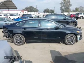 2018 Ford Fusion Titanium with VIN 3FA6P0RU6JR115236, listed as a IAAI auction lot 42111343 with 106,858 mi miles and . Bid and sale history available at DreamBid. Image 14.