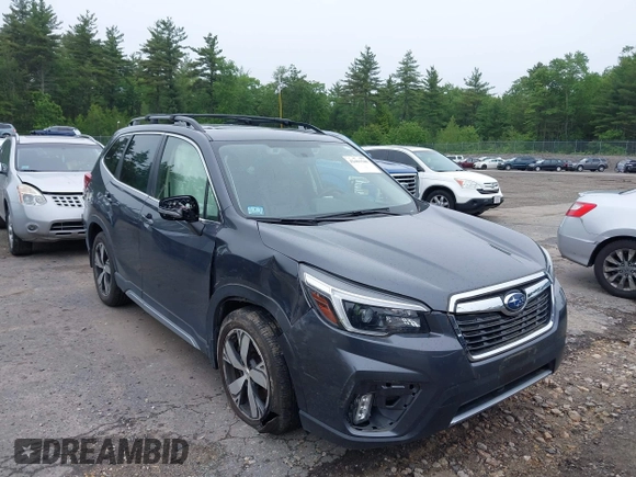 2021 Subaru Forester Touring z VIN JF2SKAXC8MH477969, wystawiony jako IAAI lot #42461540 z przebiegiem 29 143 mil mil oraz . Historia ofert i sprzedaży dostępna na DreamBid. Obrazek 1.