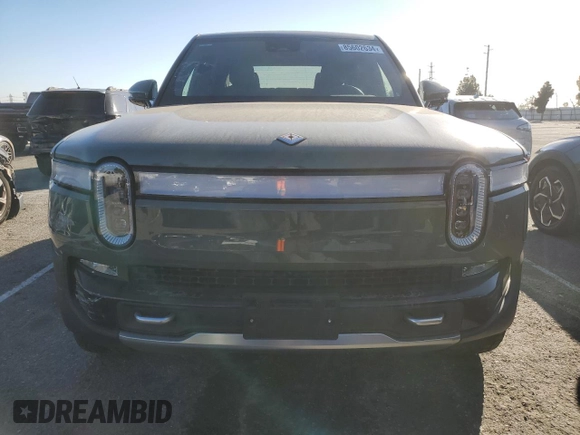 2022 Rivian R1T Launch Edition z VIN 7FCTGAAL3NN003101, wystawiony jako Copart lot #85602634 z przebiegiem 17 189 mil mil oraz Szkoda całkowita • Salvage title. Historia ofert i sprzedaży dostępna na DreamBid. Obrazek 5.