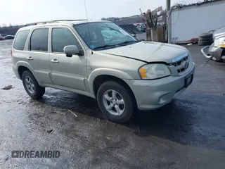 2006 Mazda Tribute S with VIN 4F2YZ04136KM15337, listed as a IAAI auction lot 41689177 with 153,720 mi miles and . Bid and sale history available at carsss.com. Image 1.