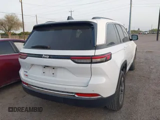2022 Jeep Grand Cherokee with VIN 1C4RJYB63N8762798, listed as a IAAI auction lot 41723969 with 23,853 mi miles and . Bid and sale history available at DreamBid. Image 4.
