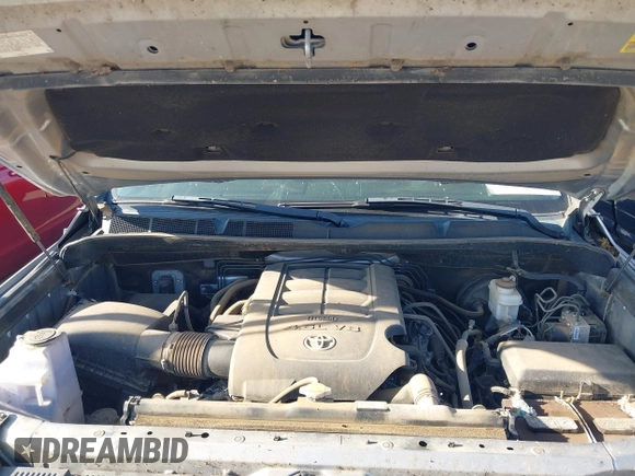 2014 Toyota Tundra SR with VIN 5TFRM5F13EX078411, listed as a IAAI auction lot 42702477 with 123,336 mi miles and . Bid and sale history available at DreamBid. Image 10.