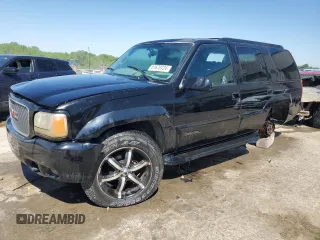 2000 GMC Denali z VIN 1GKEK13R5YR112370, wystawiony jako Copart lot #47876815 z przebiegiem 186 646 mil mil oraz Szkody całkowita. Historia ofert i sprzedaży dostępna na DreamBid. Obrazek 1.