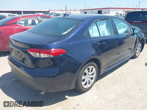 2023 Toyota Corolla LE with VIN 5YFB4MDE8PP033659, listed as a IAAI auction lot 42020847 with 42,624 mi miles. Bid and sale history available at carsss.com. Image 4.