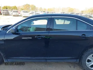 2014 Ford Police Interceptor z VIN 1FAHP2MK3EG124483, wystawiony jako IAAI lot #41018811 z przebiegiem 200 626 mil mil oraz . Historia ofert i sprzedaży dostępna na DreamBid. Obrazek 14.