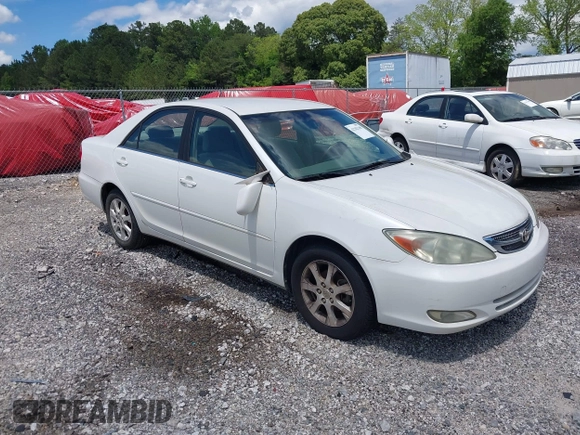 2004 Toyota Camry LE with VIN JTDBE32KX40279599, listed as a IAAI auction lot 42202160 with 288,879 mi miles and . Bid and sale history available at carsss.com. Image 1.