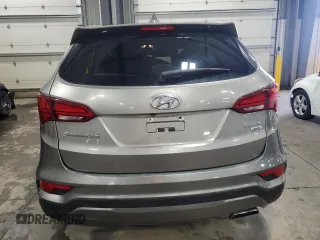 2017 Hyundai Santa Fe 2.4L z VIN 5XYZTDLB4HG440926, wystawiony jako Copart lot #54993155 z przebiegiem 171 724 mil mil oraz Szkoda całkowita • Salvage title. Historia ofert i sprzedaży dostępna na DreamBid. Obrazek 6.