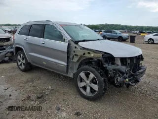 2015 Jeep Grand Cherokee High Altitude with VIN 1C4RJFCG2FC196563, listed as a Copart auction lot 56302315 with 143,759 mi miles and Salvage title. Bid and sale history available at DreamBid. Image 4.