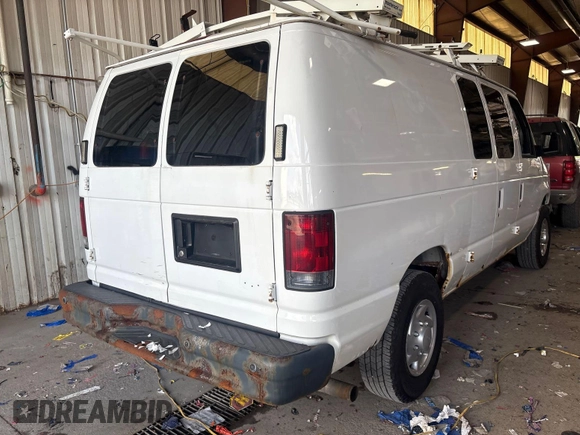 2012 Ford Econoline Cargo Commercial with VIN 1FTNE2EL1CDB21042, listed as a IAAI auction lot 42679263 with 90,458 mi miles and . Bid and sale history available at DreamBid. Image 3.