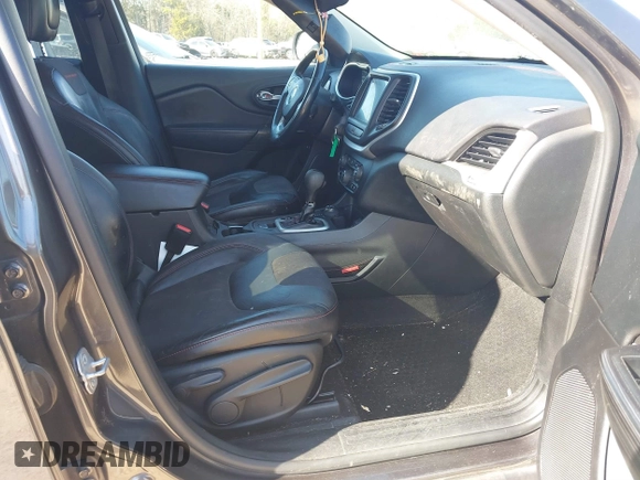 2014 Jeep Cherokee Trailhawk with VIN 1C4PJMBS6EW278987, listed as a IAAI auction lot 41789868 with 136,696 mi miles. Bid and sale history available at carsss.com. Image 5.