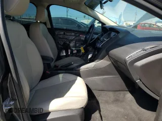 2017 Ford Focus Titanium with VIN 1FADP3J22HL279854, listed as a Copart auction lot 61209135 with 106,323 mi miles and Salvage title. Bid and sale history available at DreamBid. Image 7.