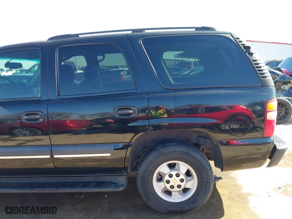 2003 Chevrolet Tahoe LS with VIN 1GNEC13V63R245581, listed as a IAAI auction lot 41599241 with 234,028 mi miles. Bid and sale history available at carsss.com. Image 18.