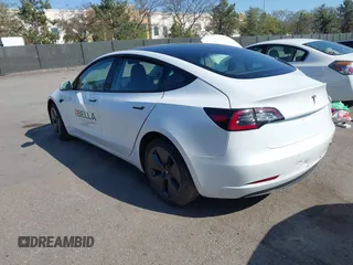 2022 Tesla Model 3 with VIN 5YJ3E1EA2NF245817, listed as a IAAI auction lot 41976493 with 32,710 mi miles and . Bid and sale history available at DreamBid. Image 3.