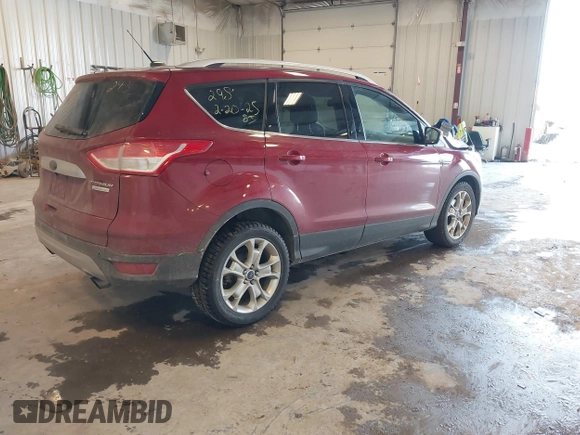2014 Ford Escape Titanium with VIN 1FMCU0JX6EUC58726, listed as a IAAI auction lot 41656779 with 162,888 mi miles. Bid and sale history available at carsss.com. Image 4.