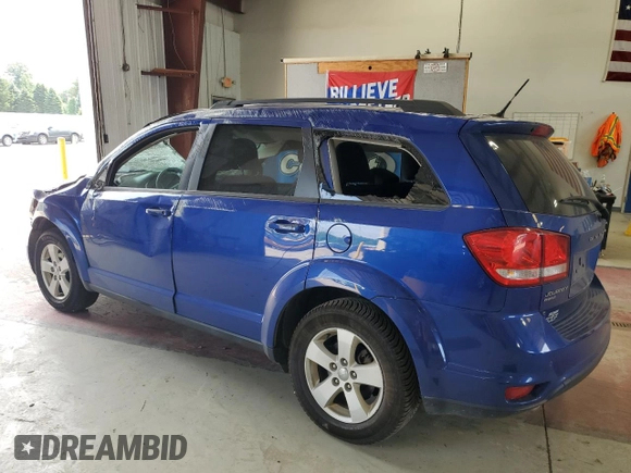 2012 Dodge Journey SXT with VIN 3C4PDDBG0CT260846, listed as a Copart auction lot 62384985 with 99,309 mi miles and Salvage title. Bid and sale history available at DreamBid. Image 2.
