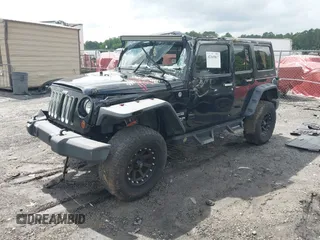 2012 Jeep Wrangler Unlimited Sport with VIN 1C4BJWDG8CL120308, listed as a IAAI auction lot 42365817 with 190,619 mi miles and . Bid and sale history available at DreamBid. Image 18.