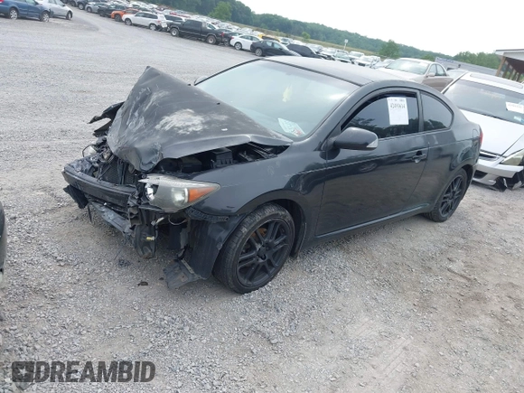 2007 Scion tC Spec with VIN JTKDE167970178053, listed as a IAAI auction lot 42493614 with 284,596 mi miles and . Bid and sale history available at DreamBid. Image 2.