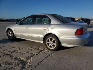 2003 Mitsubishi Galant ES z VIN 4A3AA46H13E052540, wystawiony jako Copart lot #77560984 z przebiegiem 89 173 mil mil oraz Czysty tytuł • Clean title. Historia ofert i sprzedaży dostępna na DreamBid. Obrazek 2.