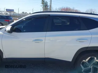 2023 Hyundai Tucson SEL with VIN 5NMJFCAE3PH261633, listed as a IAAI auction lot 41795265 with 39,374 mi miles and . Bid and sale history available at DreamBid. Image 14.
