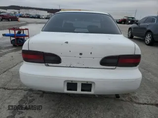 1996 Geo Prizm z VIN 1Y1SK5263TZ061291, wystawiony jako Copart lot #85366554 z przebiegiem 211 051 mil mil oraz Szkody całkowita. Historia ofert i sprzedaży dostępna na DreamBid. Obrazek 6.