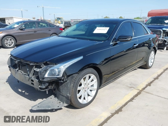2014 Cadillac CTS Luxury RWD with VIN 1G6AR5SX5E0196321, listed as a IAAI auction lot 41811575 with 139,115 mi miles. Bid and sale history available at carsss.com. Image 2.