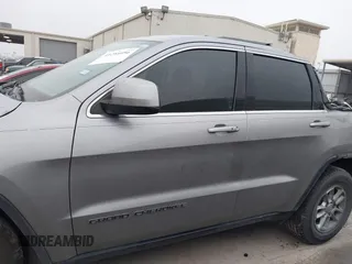 2018 Jeep Grand Cherokee Laredo E with VIN 1C4RJEAG8JC382825, listed as a IAAI auction lot 41288056 with 105,652 mi miles. Bid and sale history available at carsss.com. Image 14.