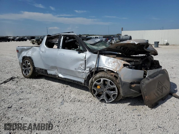 2022 Rivian R1T Launch Edition z VIN 7FCTGAAL5NN003648, wystawiony jako Copart lot #63705013 z przebiegiem Nie podano mil oraz Nie do naprawy. Historia ofert i sprzedaży dostępna na DreamBid. Obrazek 4.