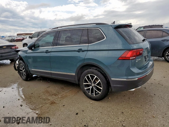 2021 Volkswagen Tiguan SE z VIN 3VV3B7AX9MM066823, wystawiony jako Copart lot #55422685 z przebiegiem 103 524 mil mil oraz Szkoda całkowita • Salvage title. Historia ofert i sprzedaży dostępna na DreamBid. Obrazek 2.