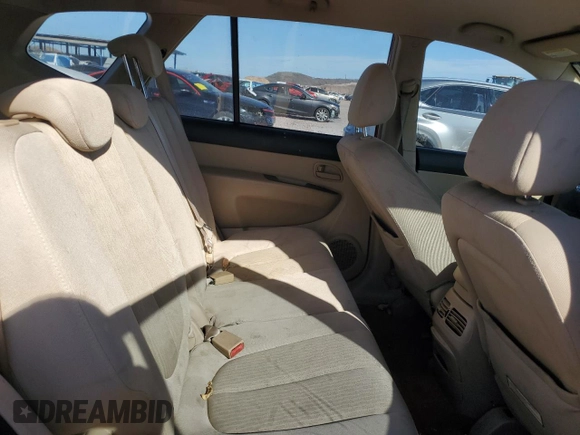2007 Kia Rondo LX with VIN KNAFG525377063667, listed as a Copart auction lot 72430004 with 128,789 mi miles and Salvage Title. Bid and sale history available at carsss.com. Image 10.