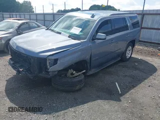 2016 Chevrolet Tahoe LT with VIN 1GNSCBKC2GR257077, listed as a IAAI auction lot 42091171 with 118,660 mi miles and . Bid and sale history available at DreamBid. Image 2.