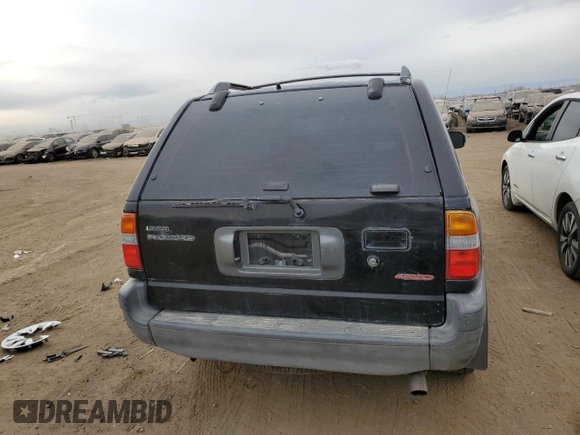 1999 Isuzu Rodeo S with VIN 4S2CM58W4X4339262, listed as a Copart auction lot 82804154 with 177,097 mi miles and Salvage Title. Bid and sale history available at carsss.com. Image 6.