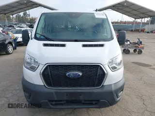 2021 Ford Transit Cargo with VIN 1FTBR1Y85MKA69355, listed as a IAAI auction lot 42544780 with 33,288 mi miles and . Bid and sale history available at DreamBid. Image 12.