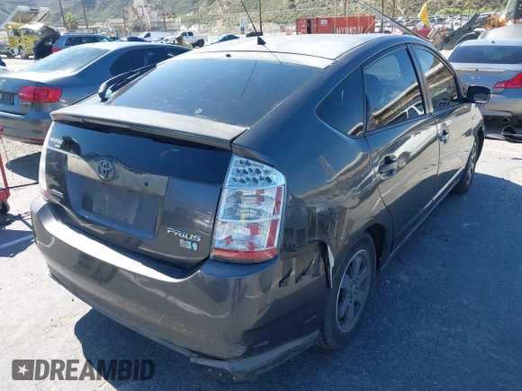 2007 Toyota Prius with VIN JTDKB20U373293385, listed as a IAAI auction lot 42218812 with 149,218 mi miles and . Bid and sale history available at DreamBid. Image 4.