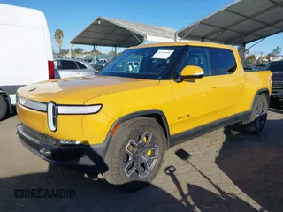 2022 Rivian R1T Adventure Package with VIN 7FCTGAAA2NN005811, listed as a IAAI auction lot 41706558 with 21,336 mi miles. Bid and sale history available at carsss.com. Image 19.