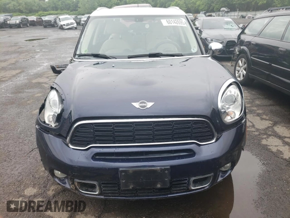 2014 MINI Countryman S с VIN WMWZC5C5XEWP36643, выставлен на аукционе Copart как лот 60142695 с пробегом 116 497 миль миль и Списание • Salvage title. История ставок и продаж доступна на DreamBid. Изображение 5.