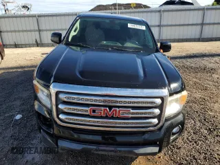 2016 GMC Canyon 2WD SLE with VIN 1GTG5CE35G1256661, listed as a Copart auction lot 82244644 with 104,496 mi miles and Clean Title. Bid and sale history available at carsss.com. Image 5.