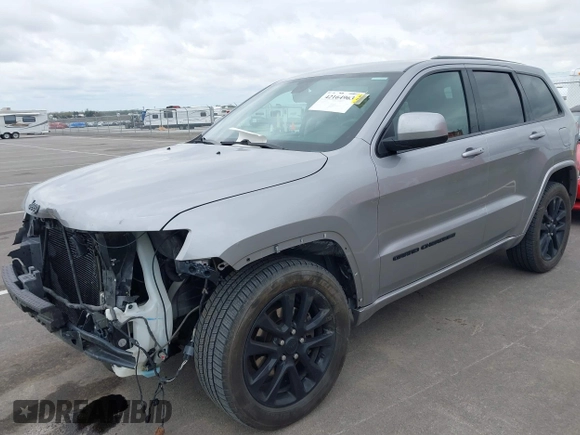 2017 Jeep Grand Cherokee Laredo with VIN 1C4RJFAG1HC701921, listed as a IAAI auction lot 42164963 with 135,039 mi miles and . Bid and sale history available at DreamBid. Image 2.