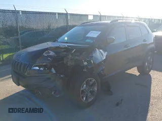 2019 Jeep Cherokee Trailhawk z VIN 1C4PJMBX0KD210316, wystawiony jako IAAI lot #42155261 z przebiegiem 100 889 mil mil oraz . Historia ofert i sprzedaży dostępna na DreamBid. Obrazek 2.