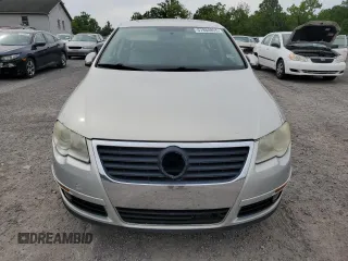2009 Volkswagen Passat z VIN WVWJK93C49P054575, wystawiony jako Copart lot #57880855 z przebiegiem 148 327 mil mil oraz Szkody całkowita. Historia ofert i sprzedaży dostępna na DreamBid. Obrazek 5.