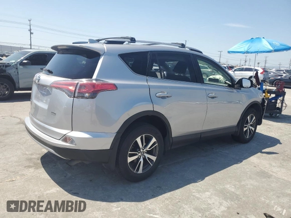2018 Toyota RAV4 XLE with VIN JTMWFREV1JD119879, listed as a Copart auction lot 52236135 with 79,897 mi miles and Salvage Title. Bid and sale history available at carsss.com. Image 3.